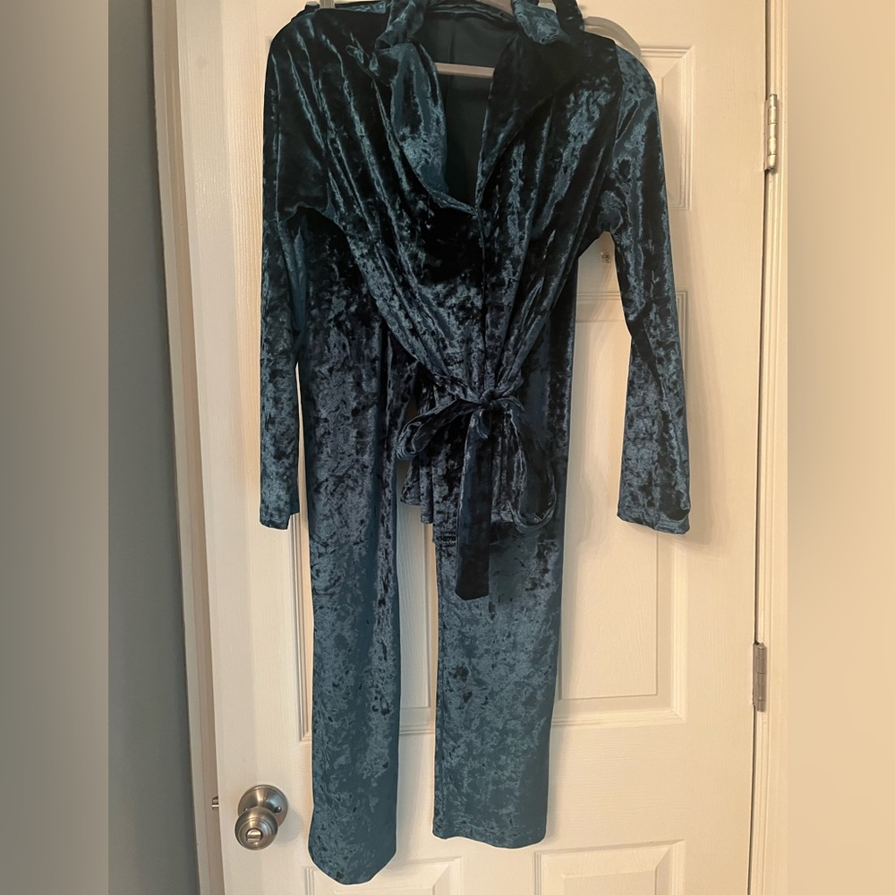 Green polyester pants suit. Perfect for the holiday.
